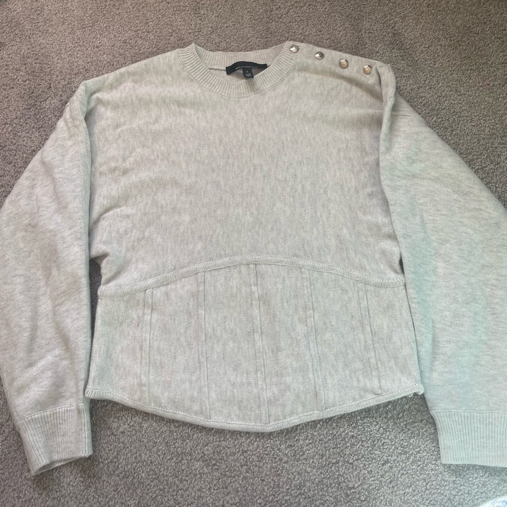 Unique gray sweatshirt with ribbing and button details